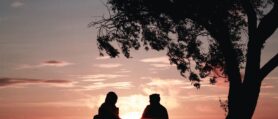 Couple at sunset retirement planning